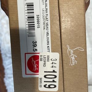 Christian Louboutin leopard flats with spikes